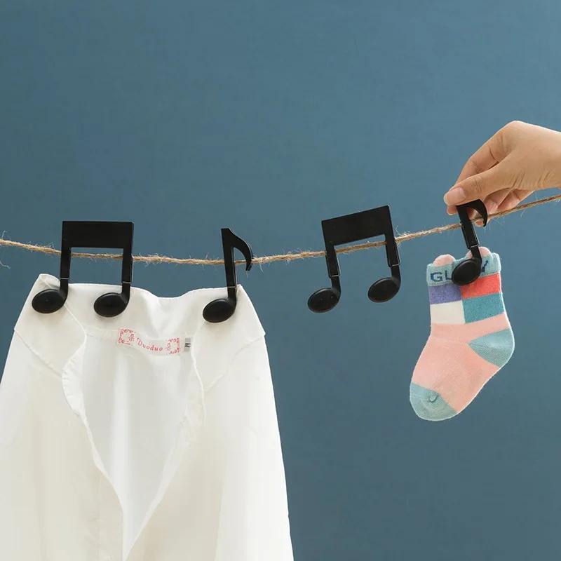 2個入り 音符型洗濯バサミ ブラック スプリングクリップ付き - Baby Clothing Drying Rack のレビューと価格