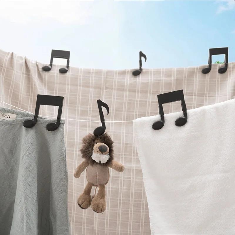 2個入り 音符型洗濯バサミ ブラック スプリングクリップ付き - Baby Clothing Drying Rack のレビューと価格